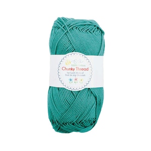 May include: A skein of teal blue 100% cotton yarn called "Chunky Thread" by Lori Holt of Bee in my Bonnet.