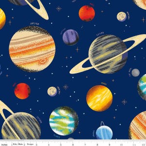May include: A navy blue fabric with a repeating pattern of planets and stars. The planets are illustrated in a cartoon style and include Jupiter, Saturn, Mercury, Venus, Earth, Mars, Neptune, and the Moon. The fabric is perfect for quilting, sewing, and crafting.