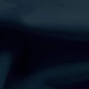 May include: A dark blue fabric background with a smooth, textured surface.