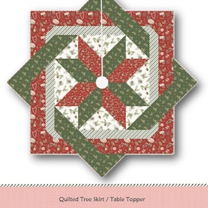 May include: A square-shaped quilted tree skirt or table topper titled Star Weave Tree Skirt by Deonn Stott. The design features a central star pattern in red, green, and white with holiday-themed prints, including pinecones and hearts.