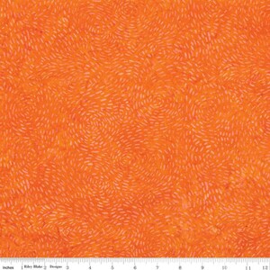 May include: Orange fabric with a white swirl pattern. The fabric is 12 inches wide and has a ruler with inches marked along the bottom.