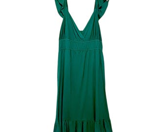 May include: A green sleeveless maxi dress with a ruffled neckline and hem. The dress has a fitted bodice and a flowy skirt.