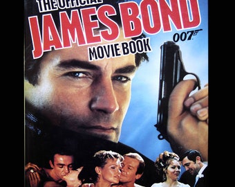 Official James Bond Movie Book - 25th Anniversary Edition (1987) Plus a 007 bookmark & Roger Moore biography!