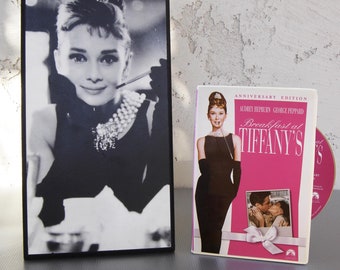 Breakfast at Tiffany’s photo art plaque of Audrey Hepburn plus the Anniversary Edition movie DVD and a movie ad book!