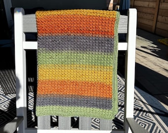 Manta de bebé de ganchillo en colores otoñales