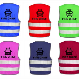 May include: Six high-visibility safety vests in blue, red, green, pink, navy, and burgundy. Each vest has a reflective stripe and the text "FIRE CHIEF" with a fire engine graphic. Ideal for emergency services.