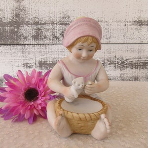 Little Girl Figurine Holding Kitten
