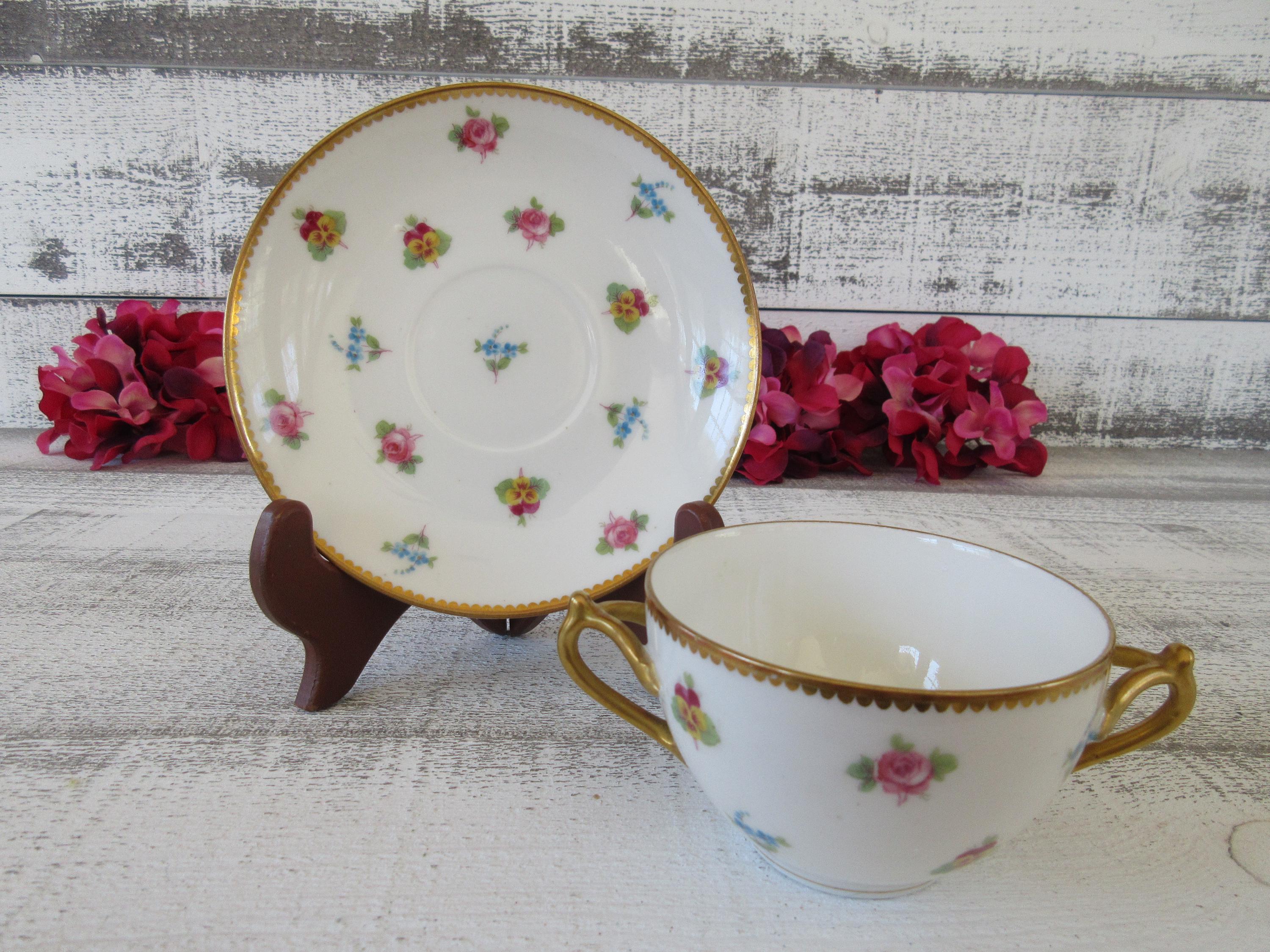 Elegant Two Handle Limoges Bernardaud and Co Teacup and Saucer Duo 