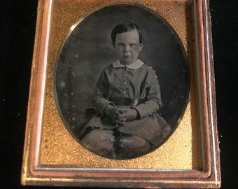 identified in pencil on the inside of case. 16 th plate daguerreotype of a young boy