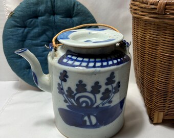 Antique Chinese Canton export blue and white railroad teapot in travel basket.