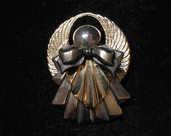 Gold tone Angel pin brooch.