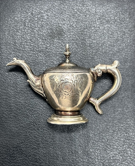 Revere teapot sterling  brooch.
