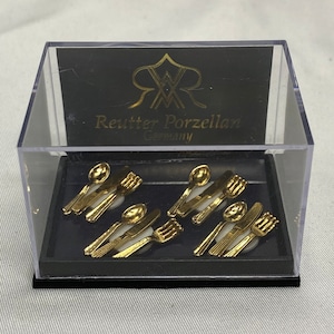 Reutter Porzellan Gold tone cutlery set for four made in Germany.