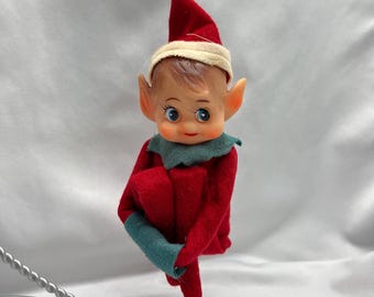 Vintage knee hugger Christmas pixie Elf 1950s.