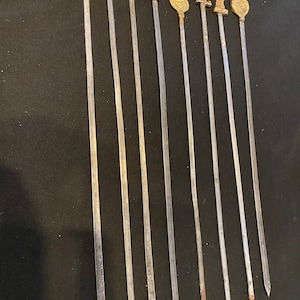 Eight Vintage  brass and stainless steal kebab skewers