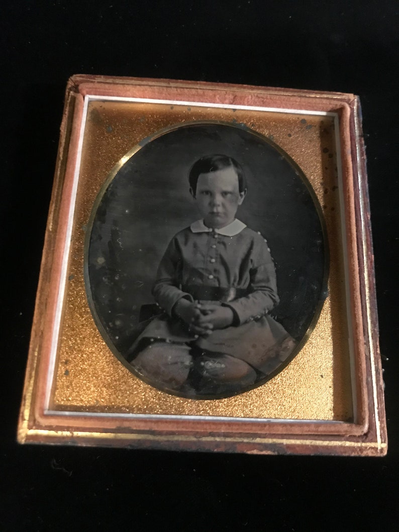 identified in pencil on the inside of case. 16 th plate daguerreotype of a young boy