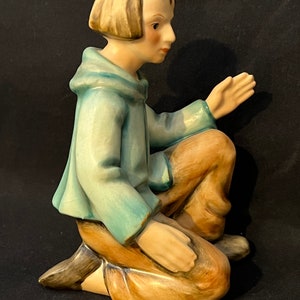 Goebel Hummel kneeling shepherd boy nativity figurine.