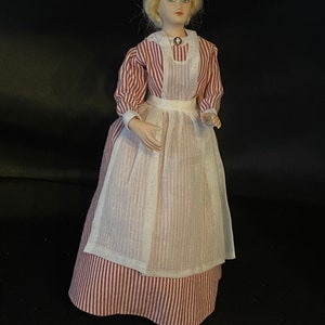 Artisan porcelain dollhouse maid or Mrs. Clause doll.