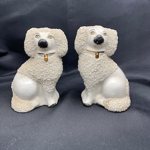 Mini antique English Staffordshire poodle dogs.