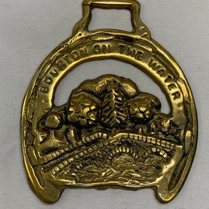 Vintage horse brass “Burton on the water”.
