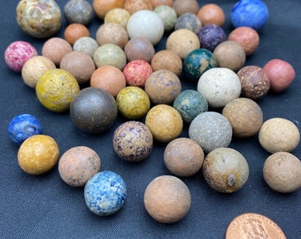 Antique lot of clay marbles, Bennington style.