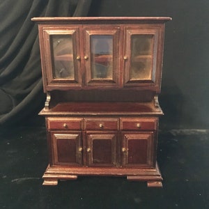 Vintage doll house hutch with glass doors.
