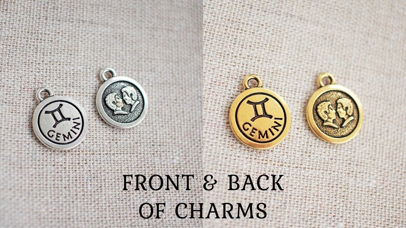 May include: Two Gemini zodiac charms, one silver and one gold, displayed front and back. The front of each charm features the Gemini symbol and the word "GEMINI". The back of each charm shows two figures.