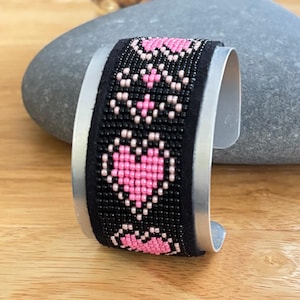 Four Pink Hearts on black background Seed Bead Hand Loomed Aluminum Cuff Bracelet