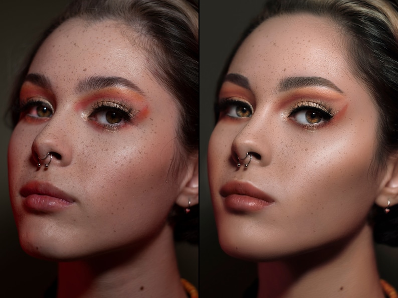 May include: A portrait of a person with freckled skin, wearing eye makeup with orange and gold tones. They have a septum piercing and a neutral lip color. The image is well-lit, highlighting the details of the makeup.