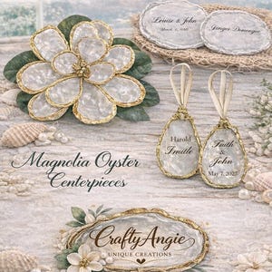 May include: Coastal wedding collection featuring magnolia oyster centerpieces and decorative name tags. The image showcases a large, flower-shaped centerpiece with gold trim, along with several name tags with names and dates. The Crafty Angie logo is also visible.
