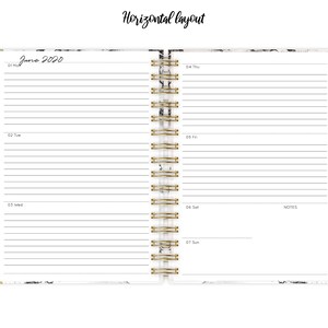 May include: A white planner with a gold spiral binding. The planner has a marble pattern and the text "Jane 2020" at the top. The planner is open to the week of June 1st to June 7th. The days of the week are labeled at the top of each page. The planner has a notes section on the right side.