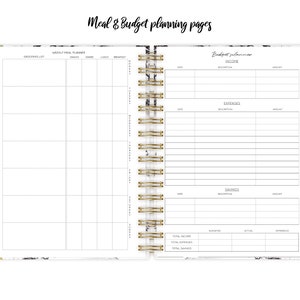 May include: A white planner with a marble pattern and gold accents. The left page has a grocery list and a weekly meal planner. The right page has a budget planner with sections for income, expenses, and savings.