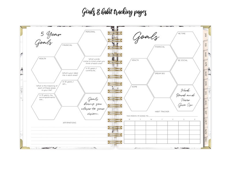 May include: A white planner with a marble pattern and gold accents. The planner has a section for 5-year goals with hexagonal shapes for different areas of life, such as health, financial, and personal. It also has a section for monthly goals and a habit tracker.