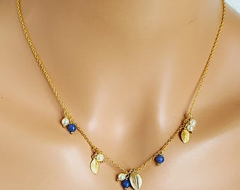 Joyas de lapislázuli y perlas, cadena de oro de 18 quilates, rama de hoja de oro
