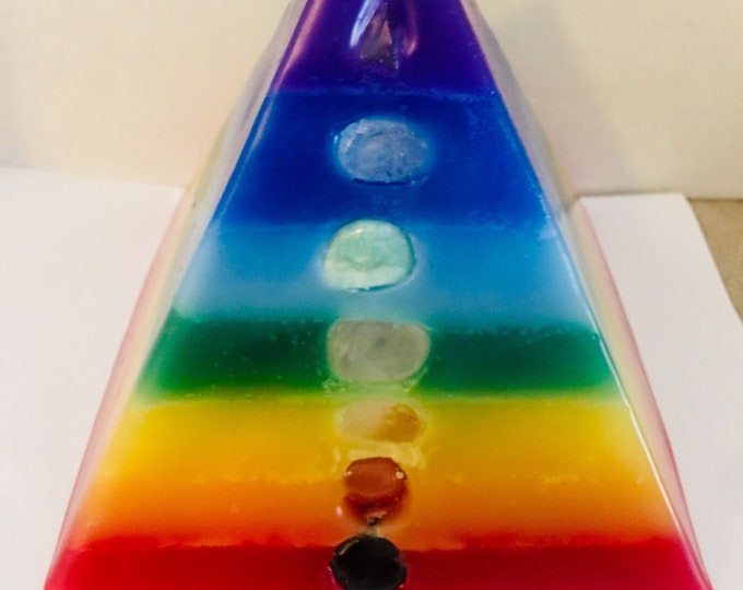 7Layer Crystal Chakra Mini Pyramid Candle inlaid w/ Crystals & Gems that correspond to each Chakra illuminating when lit! Burns for 150 hrs