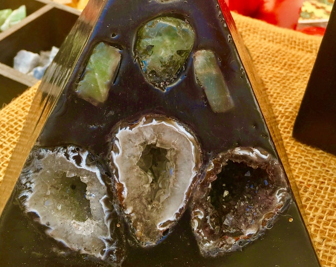 Crystal 3 Geode Black Pyramid Candle inlaid with Amethyst,Clear Quartz, Selenite , Citrine, & BCrystal Geodes that  illuminate when lit.