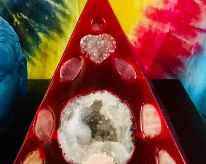 Crystal Candle~ Deep Red  Pyramid Candle with an inlaid Crystal Geode, Amethyst, Clear Quartz and Rose Quartz that illuminate when lit.
