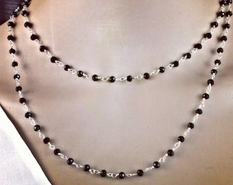 Delicate hand-made necklace with polished Onyx beads