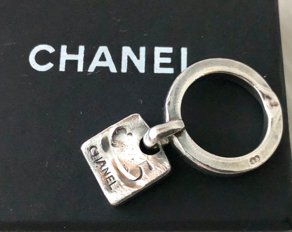Authentic Chanel Sterling Silver Ring With Dangling Iconic 