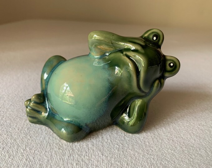 reclining frog statue