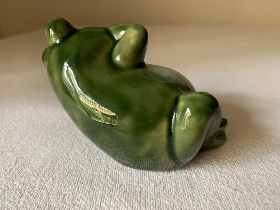 reclining frog statue