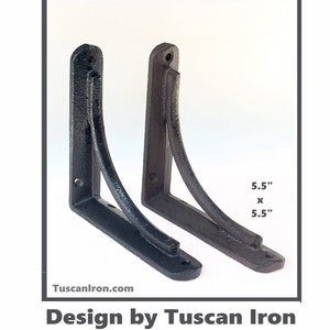 May include: Two black metal shelf brackets with a curved design. Each bracket measures 5.5 inches by 5.5 inches.  The brackets are made by Tuscan Iron.