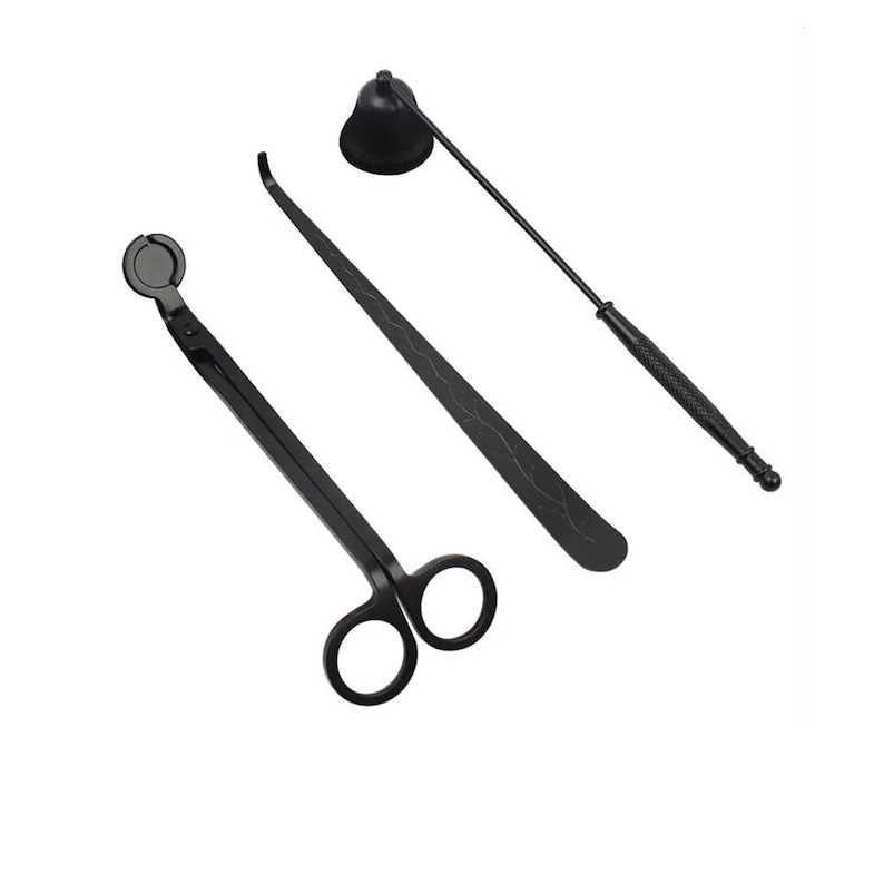 May include: A set of three black candle wick trimmers. The set includes a pair of wick trimmers with a scissor-like design, a long wick dipper with a decorative pattern, and a candle snuffer with a bell-shaped top.