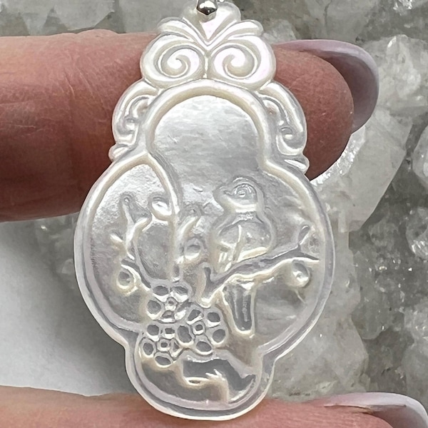 Moment in the Orchard-Carved Mother of Pearl Bird Pendant