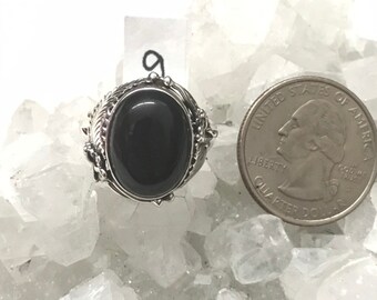 Ring van zwarte onyx, maat 9
