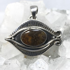 CLEARANCE Sutured Ammonite Eye of Horus Pendant