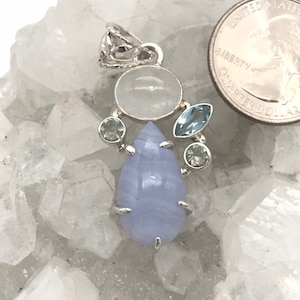 Gorgeous Blue Lace Agate, Moonstone and Blue Topaz Pendant .