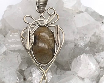Wire Wrapped Rutilated Quartz Pendant