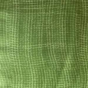 May include: Green fabric with a white grid pattern. The fabric has a subtle texture.