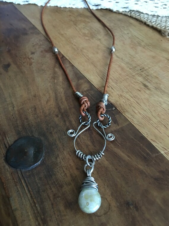 Items similar to Leather necklace / wire wrapped necklace / wire